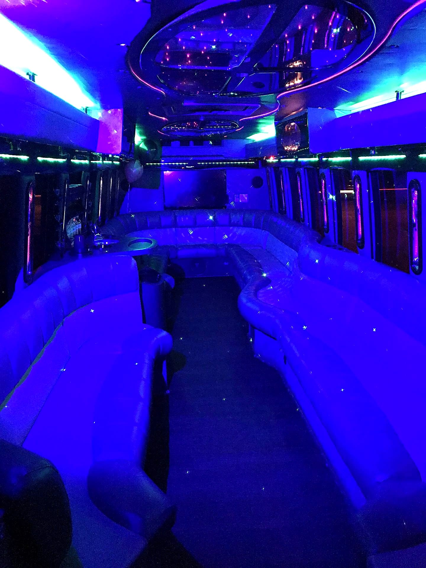Luxury party bus interior with star ceiling